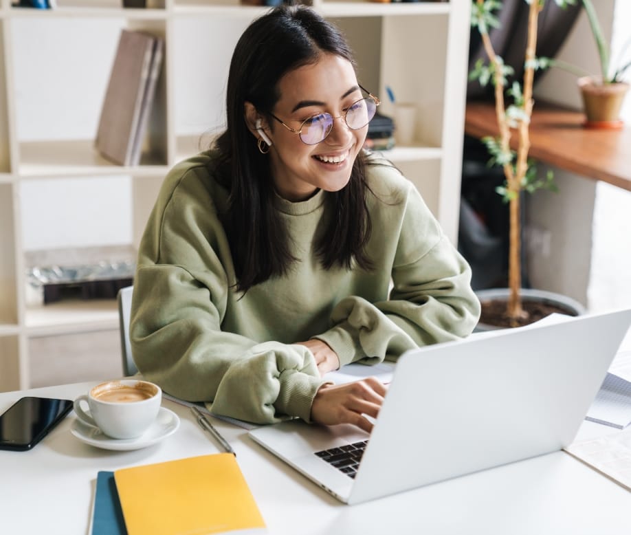 female student applying for admission on computer